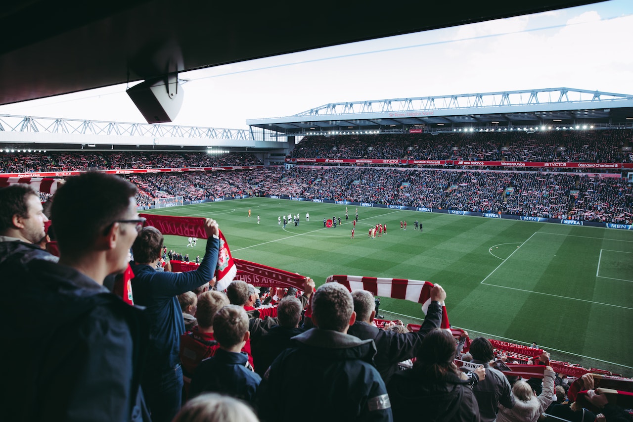 Fans watching football
